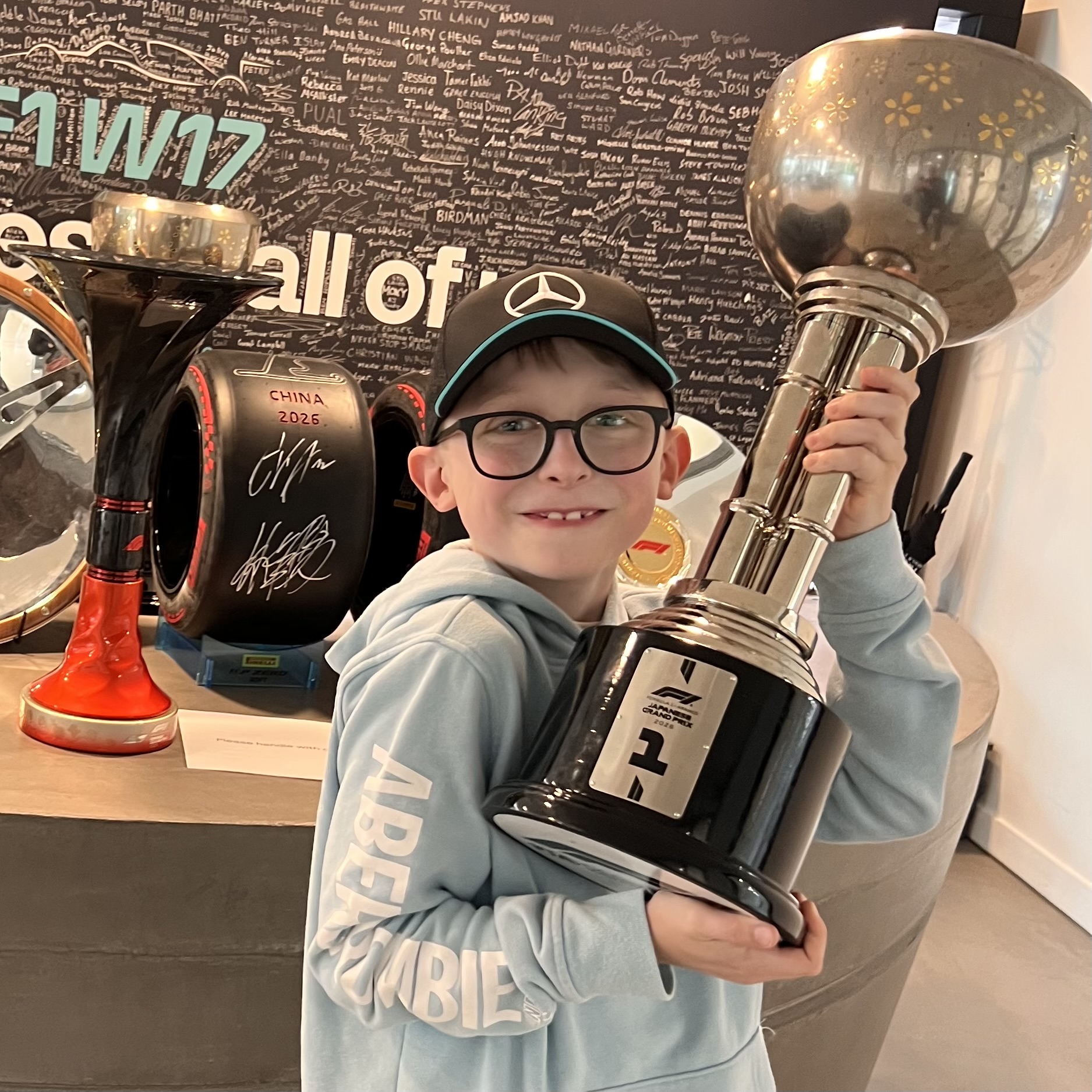 Ethan holding the same Japanese Grand Prix trophy